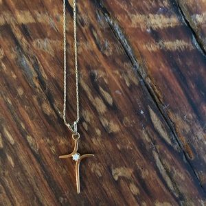 14k gold cross with diamond chip